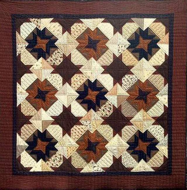 pieced quilt, hand quilted